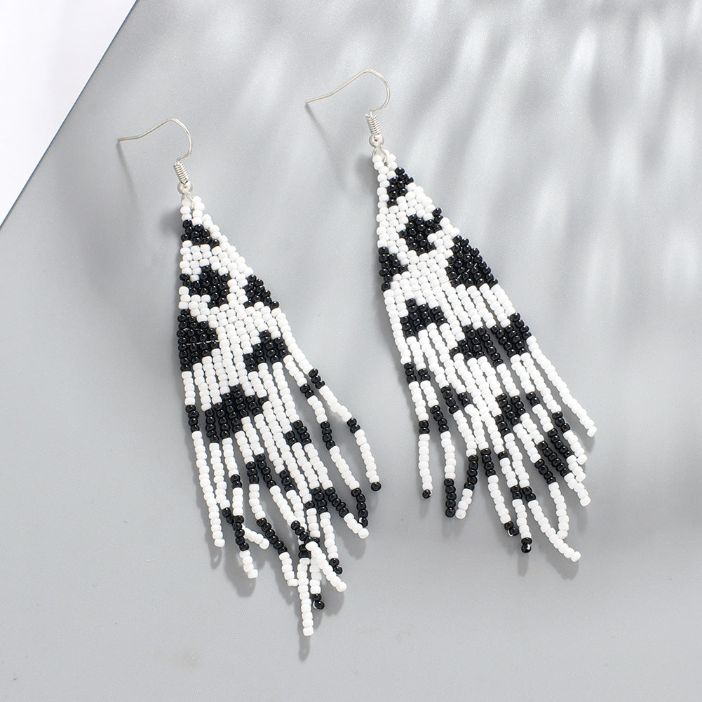 Wholesale Bohemian Handwoven Cow Pattern Long Tassel Rice Bead Earrings